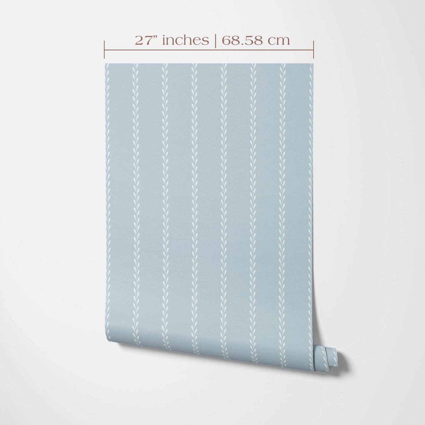 A light blue wallpaper with a repeating pattern of vertical lines, measuring 27 inches by 68.58 cm.