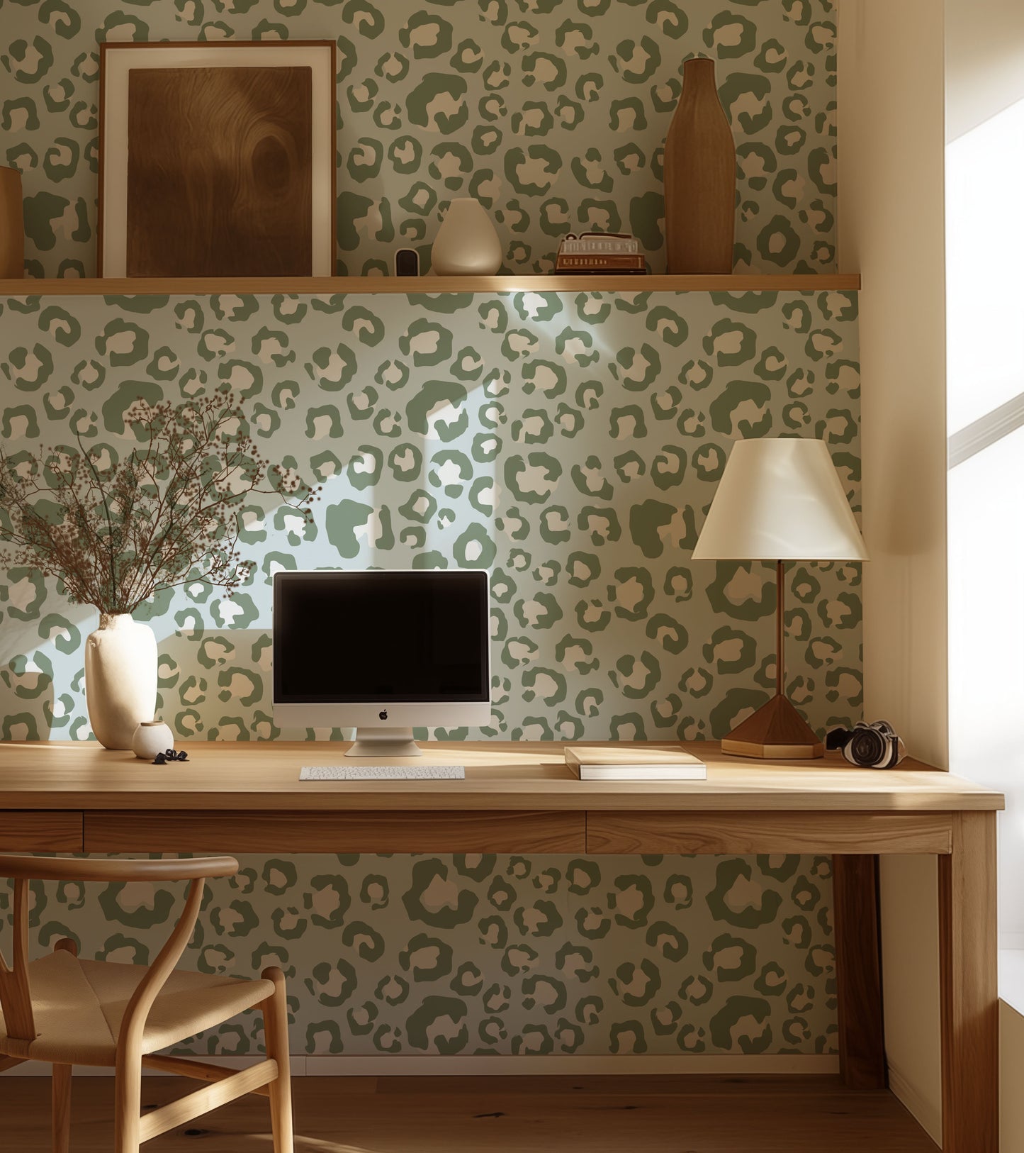 a desk with a computer on top of it
