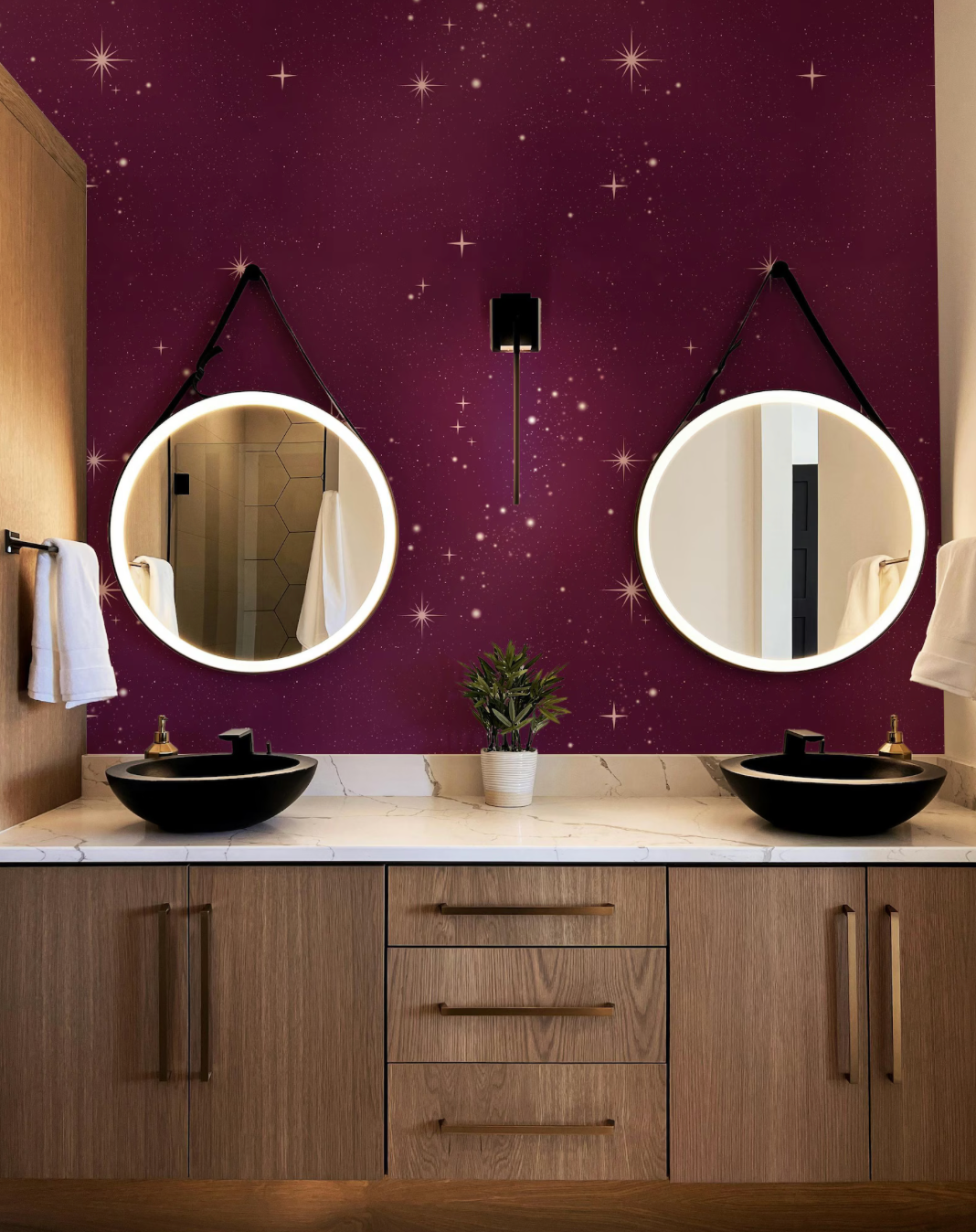 a bathroom with two sinks and a large mirror
