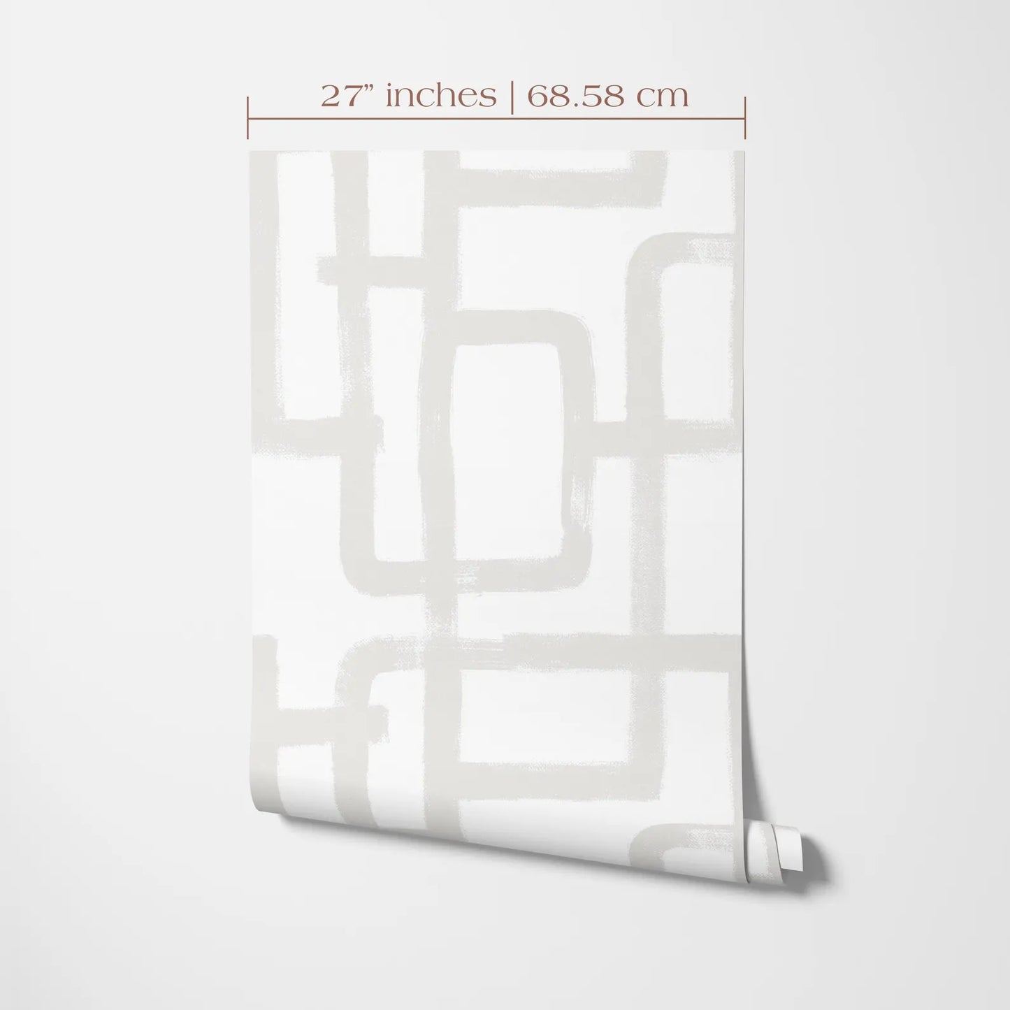 a piece of wall art with a geometric pattern of white lines and rectangles. The wall art is 27 inches tall and 68.58 cm in width.