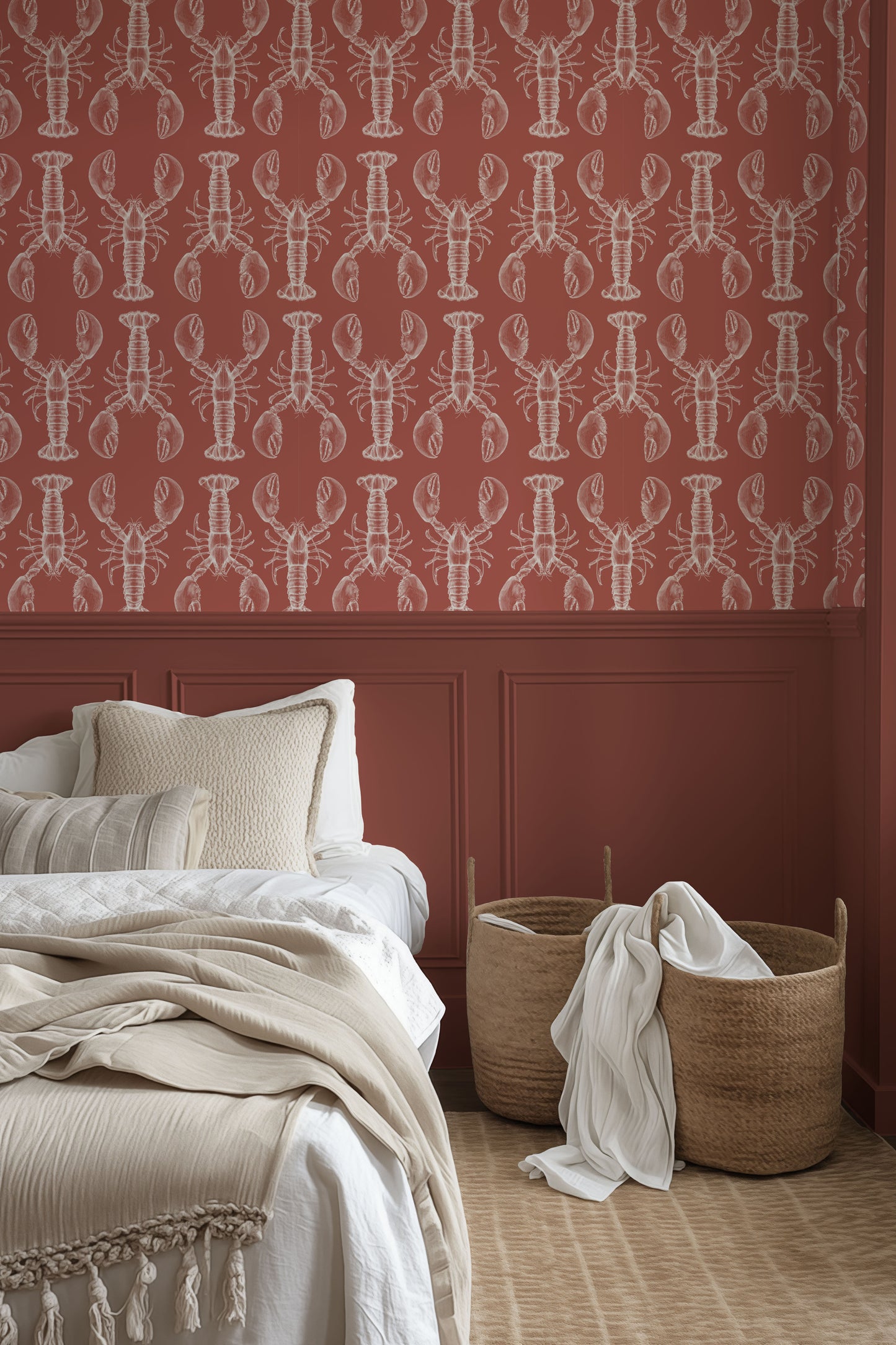 a bedroom with a red wall and a white bed