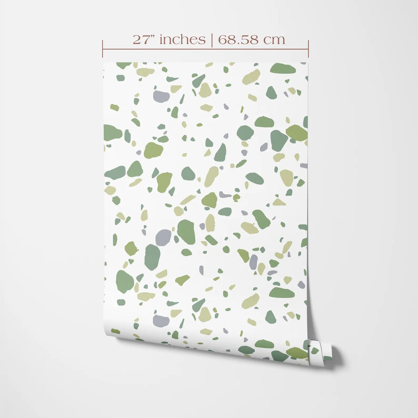 a pattern of green and gray stones or pebbles on a white background.