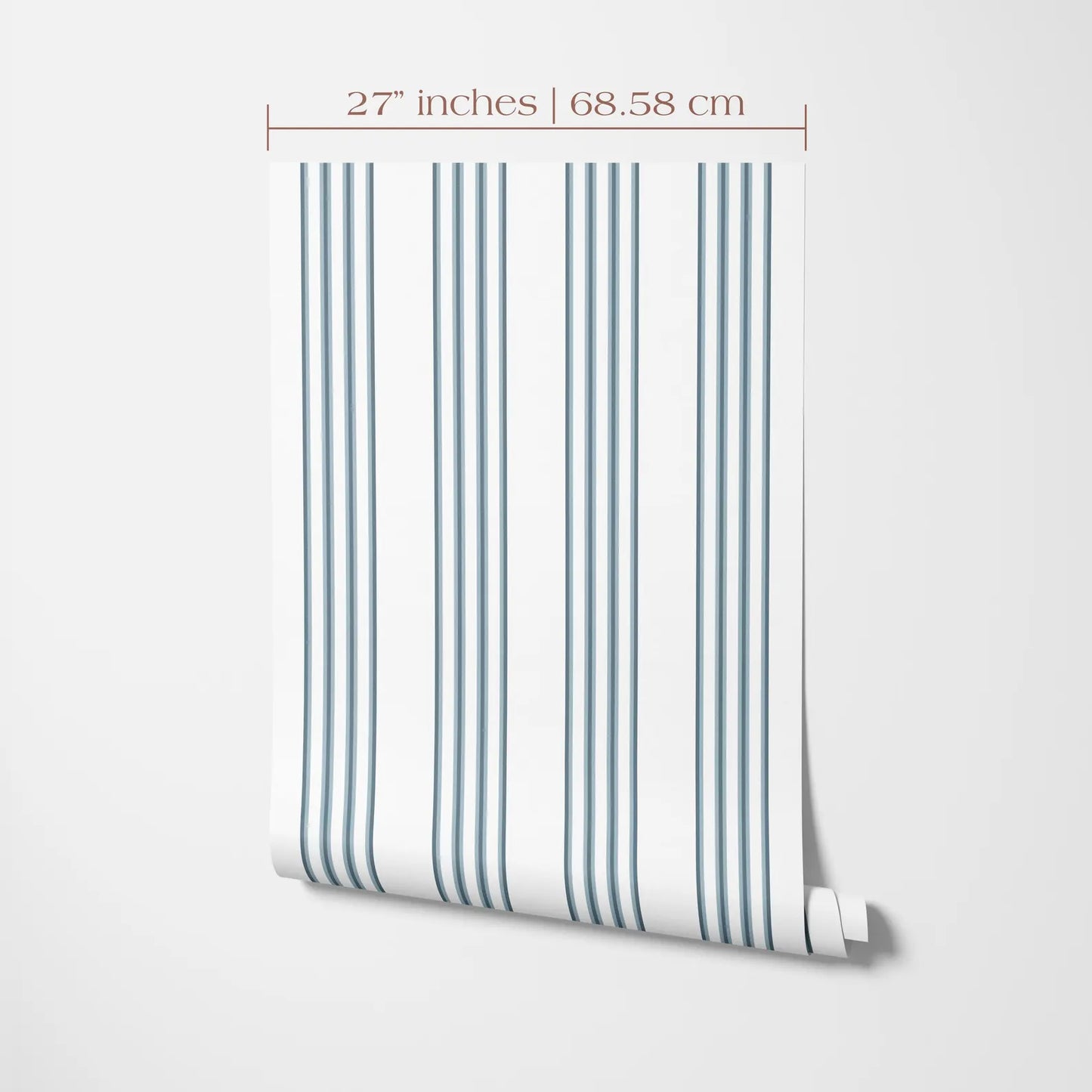 a roll of wallpaper with a repeating pattern of vertical stripes in shades of blue and white. The wallpaper is displayed against a white background, and there is a measurement scale indicating the size of the wallpaper in inches and centimeters.