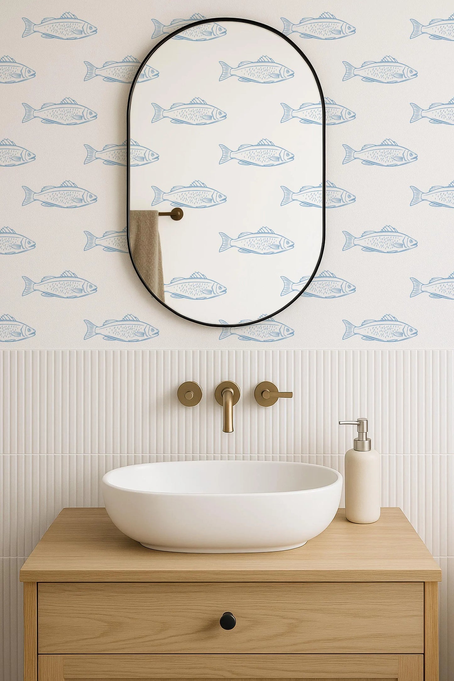 a bathroom with a white sink, a mirror, and a fish-themed wallpaper.