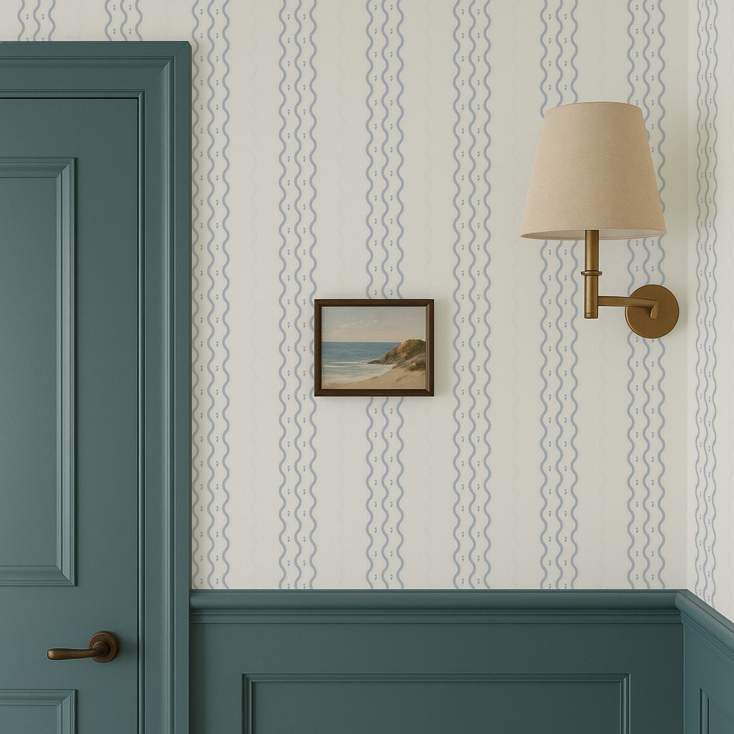 a wallpapered wall with a framed picture hanging on it, a green door, and a wall-mounted lamp.