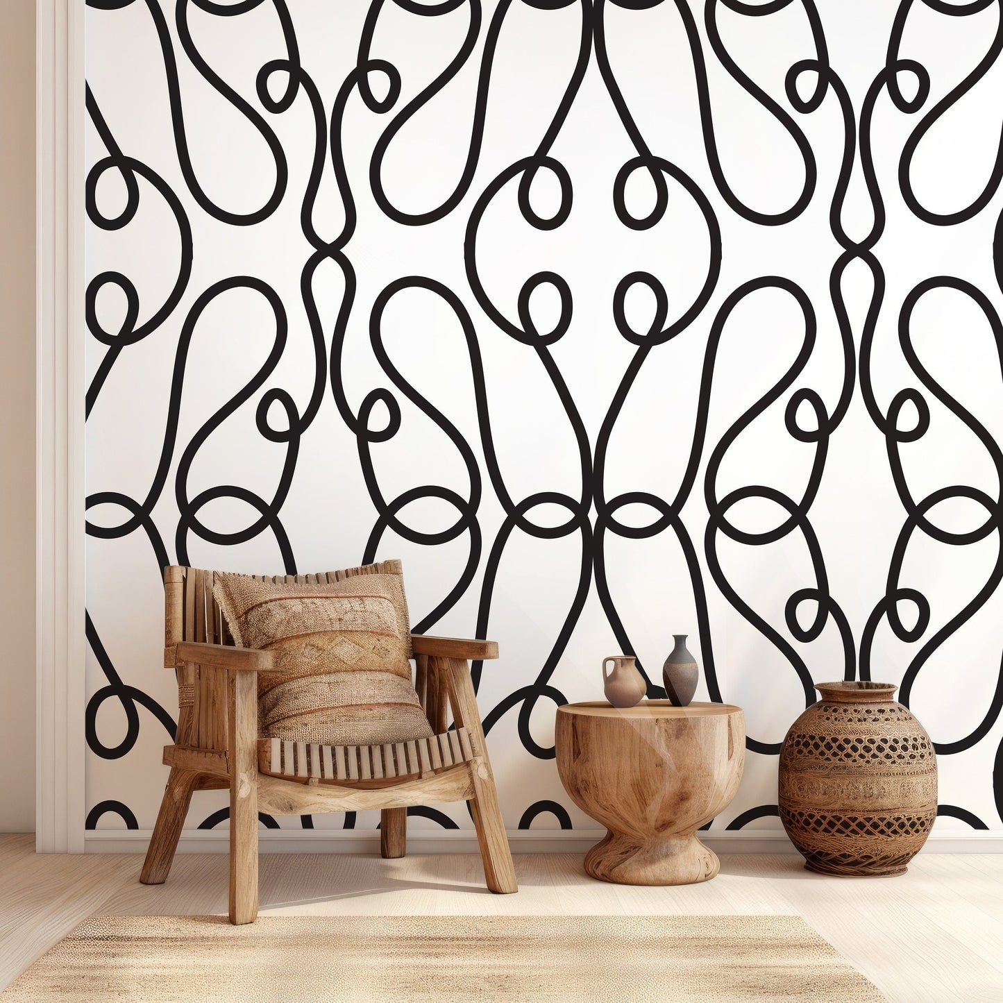 a chair and a table in front of a wall