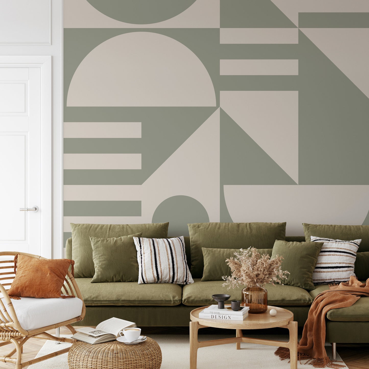 a living room filled with furniture and a large wall mural