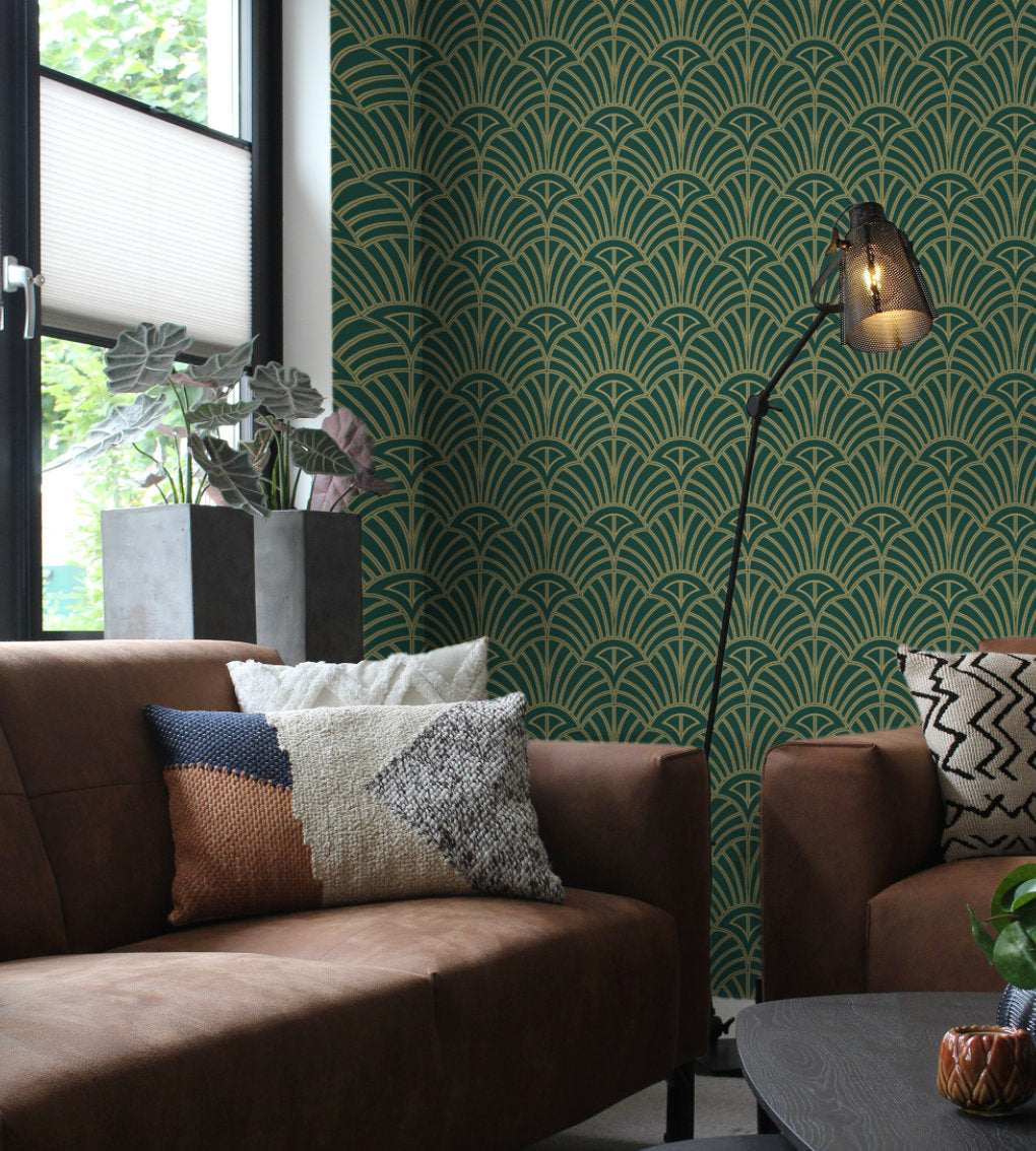 a living room with a couch, chair and lamp
