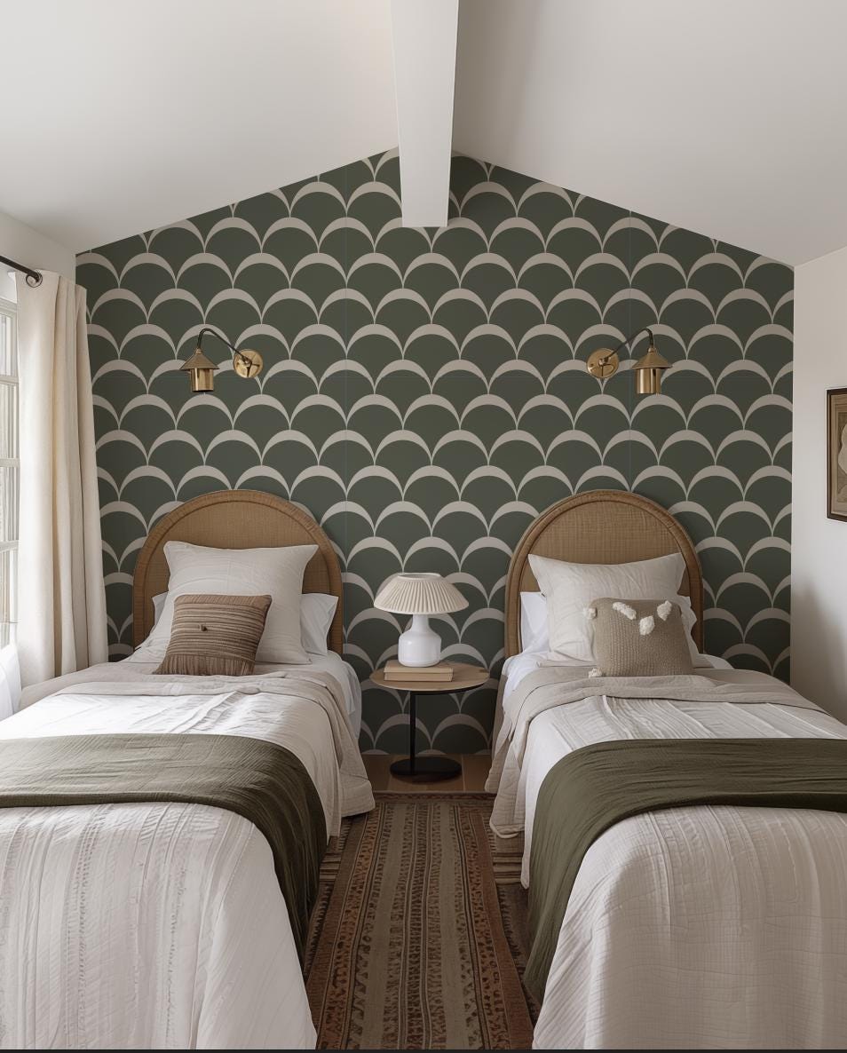a couple of beds sitting next to each other in a bedroom