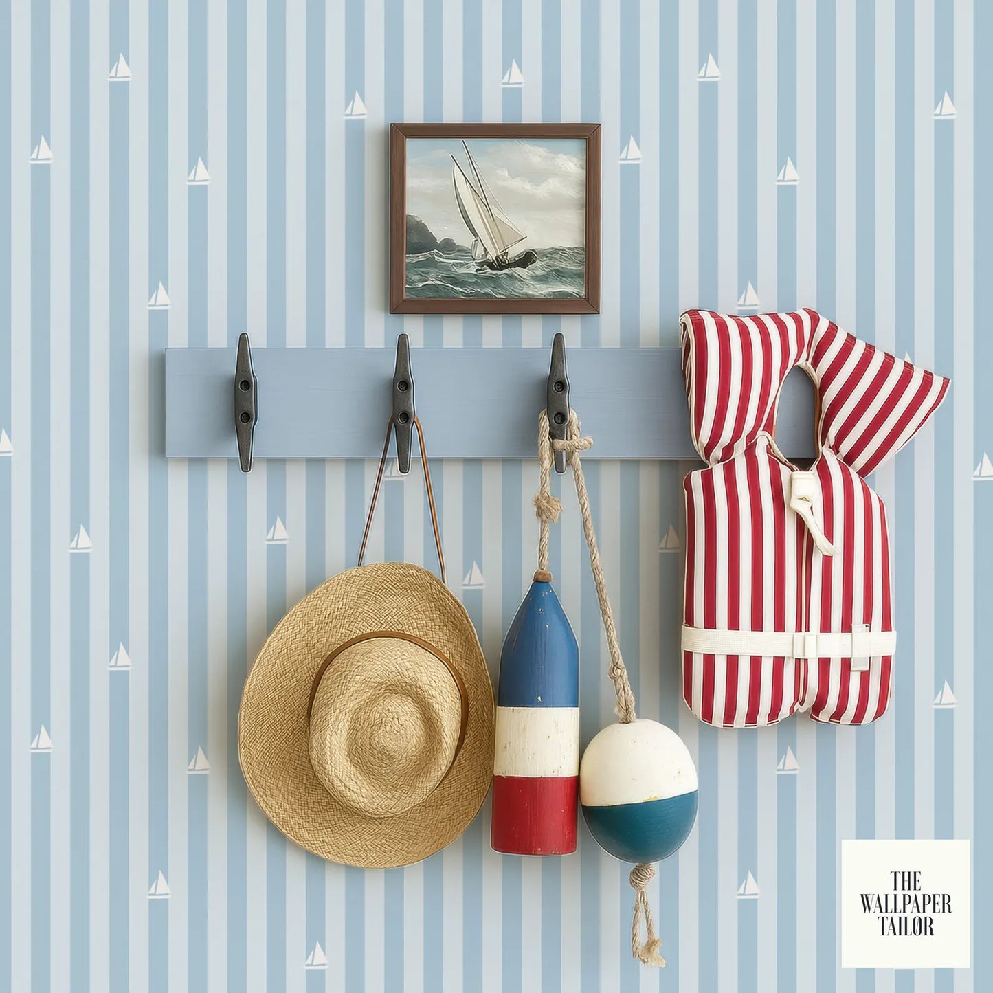 a wall with a blue and white striped pattern, displaying various nautical items such as a hat, a life preserver, and a buoy.