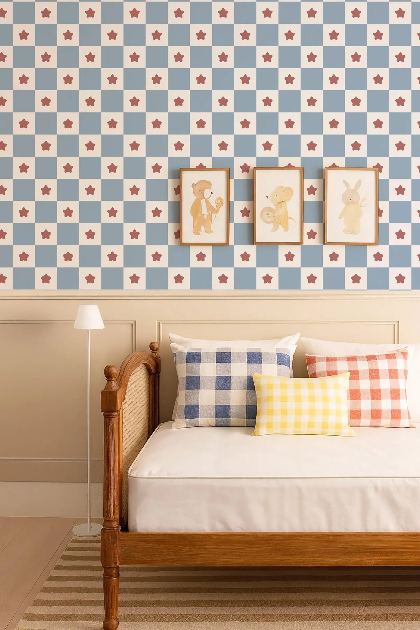 a cozy bedroom setting with a wooden bed frame, a checkered wall with three framed animal pictures, and a striped rug on the floor.