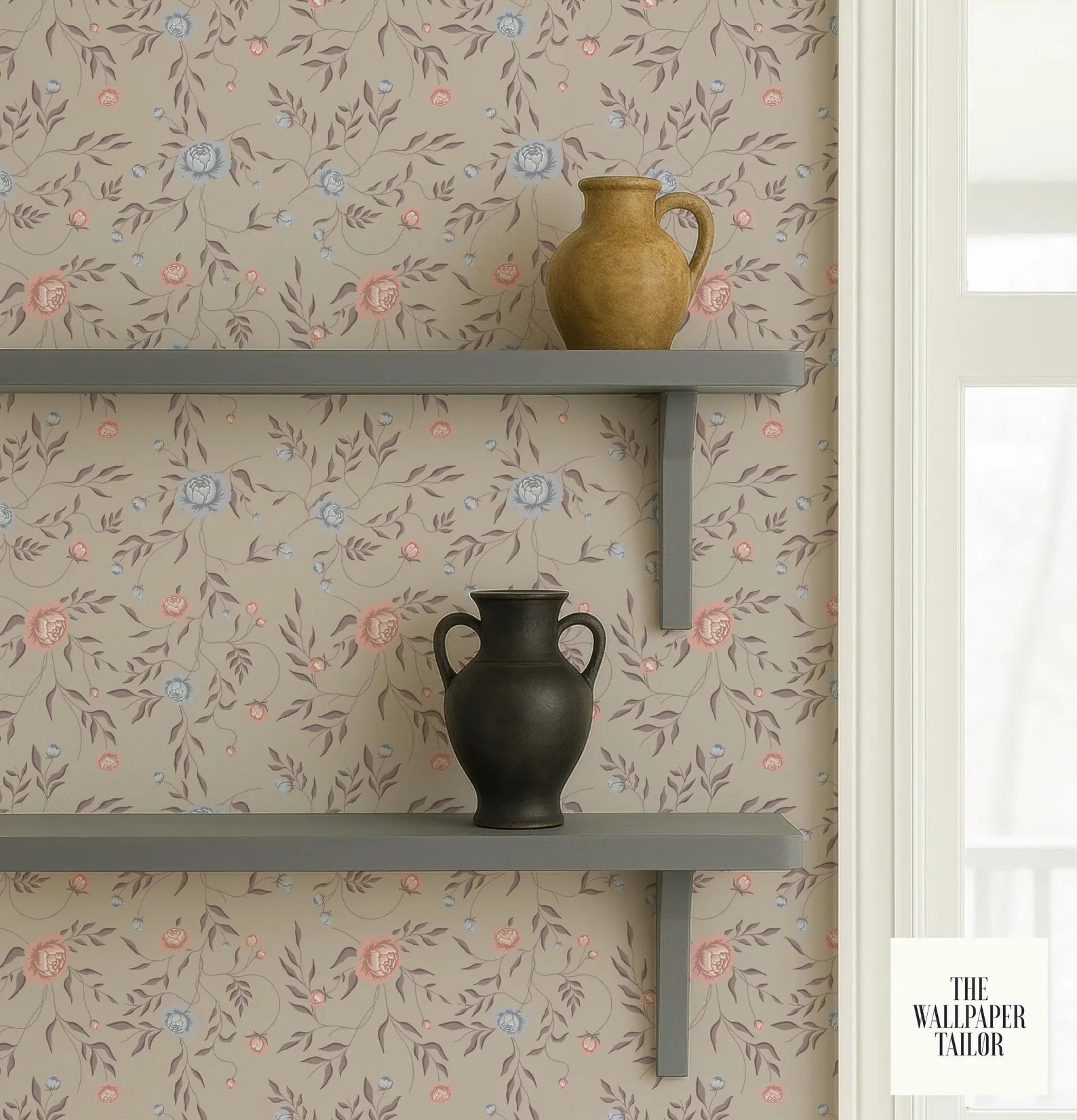 two decorative vases placed on a shelf against a wall with a floral wallpaper pattern.