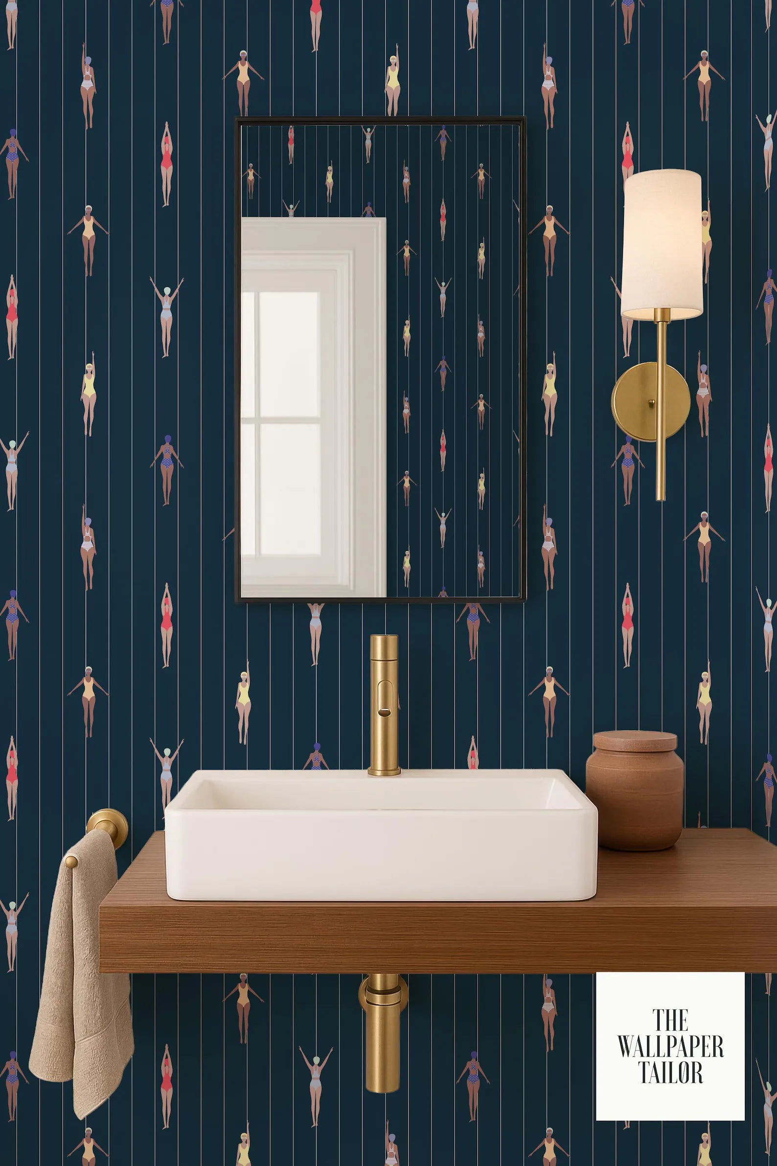 a bathroom with a white sink, a mirror, and a wallpapered wall with a repeating pattern of stylized human figures.