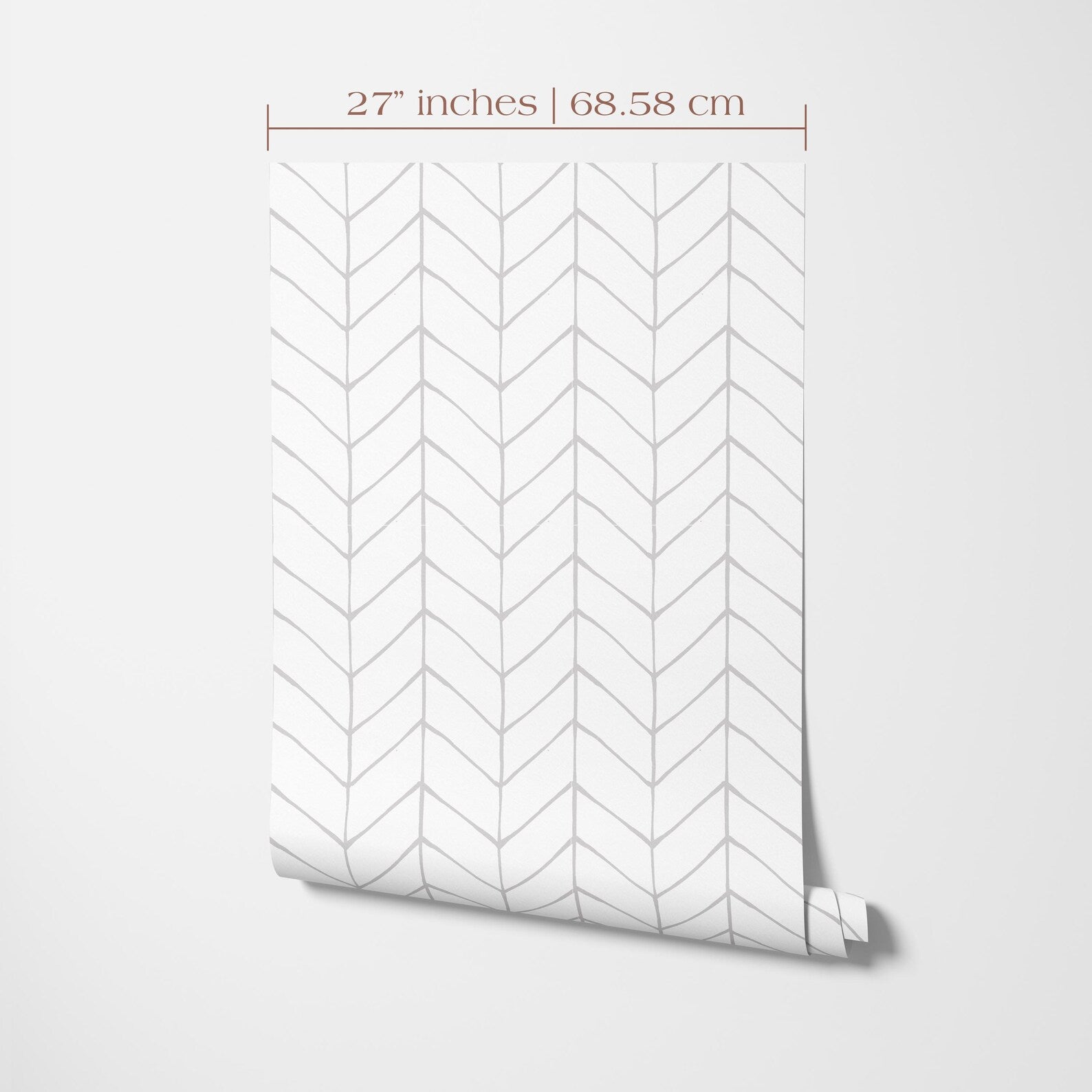 a white wall with a pattern of chevron lines, which appears to be a wallpaper or a similar decorative material. The image is described as having a size of 27 inches by 68.58 centimeters.