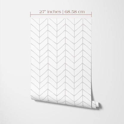 a white wall with a pattern of chevron lines, which appears to be a wallpaper or a similar decorative material. The image is described as having a size of 27 inches by 68.58 centimeters.