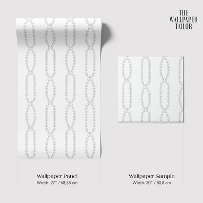 two identical rolls of wallpaper with a repeating pattern of leaves or vines. The rolls are of different sizes, with one being larger than the other.