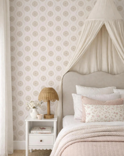 a cozy and inviting bedroom with a canopy bed, a white nightstand, and a floral patterned wallpaper.