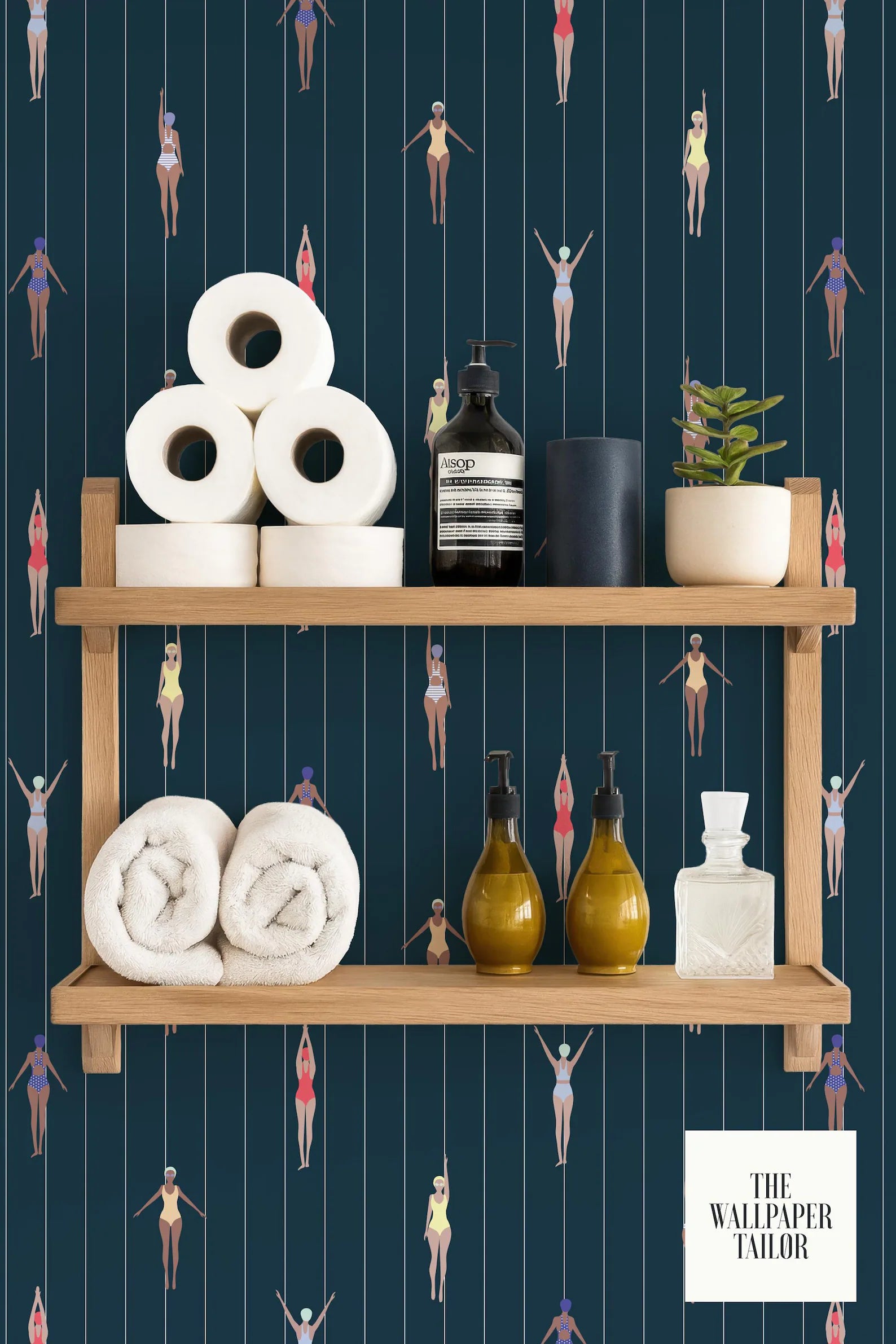 a bathroom shelf with various toiletries and towels, including a bottle of soap, a bottle of lotion, and a bottle of shampoo. The shelf is set against a dark blue background with a pattern of swimming figures.