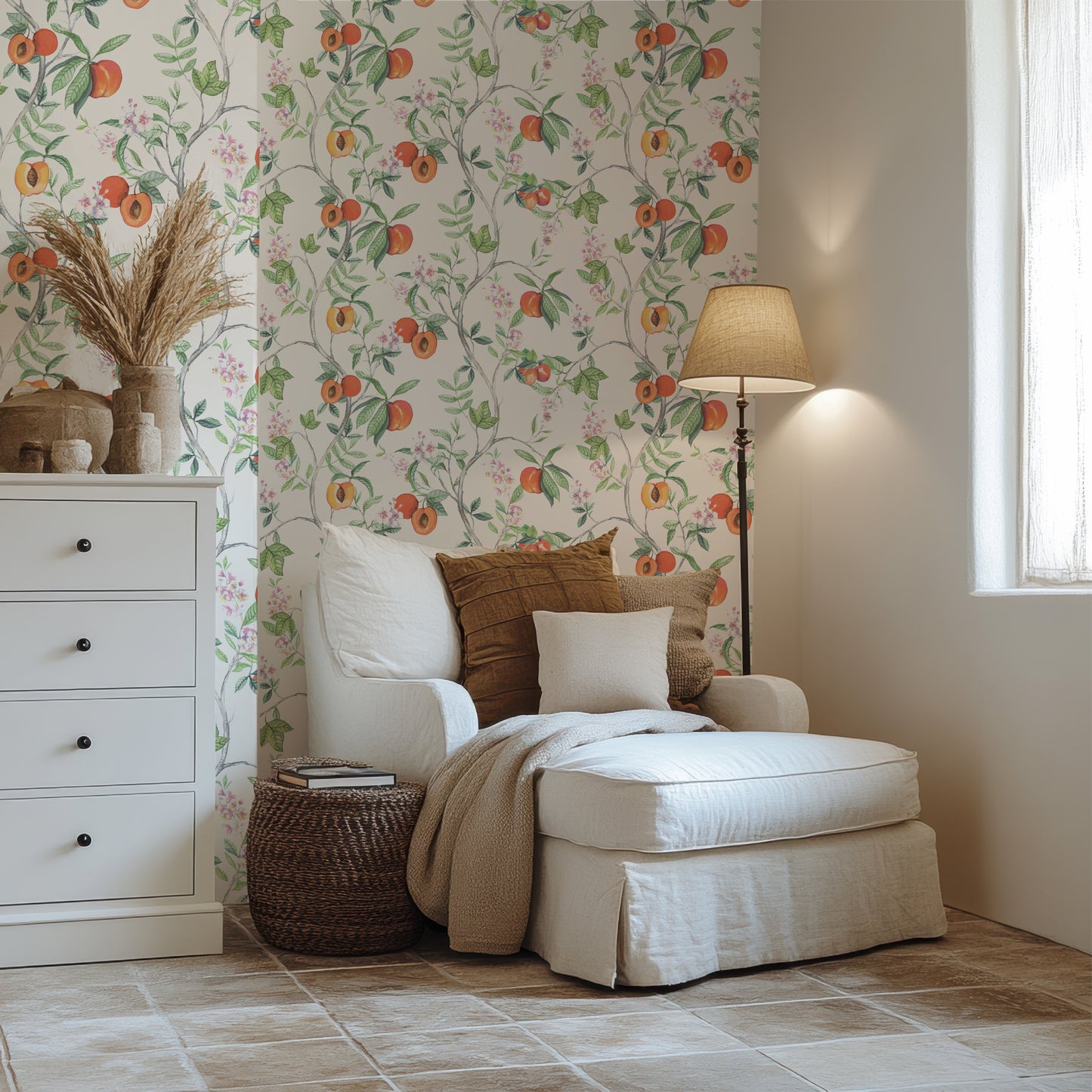 a white chair sitting next to a white dresser