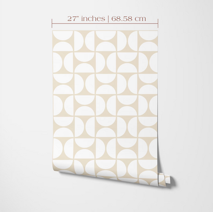 a patterned wallpaper or wall covering with a repeating geometric design of circles and ovals in various shades of beige.