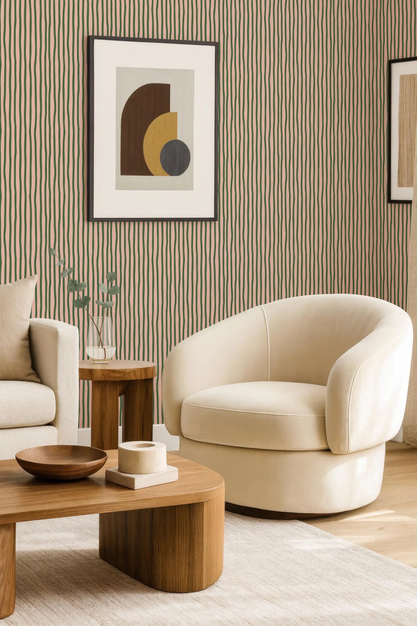 a modern living room with a white armchair, a wooden coffee table, and a framed abstract artwork on the wall.