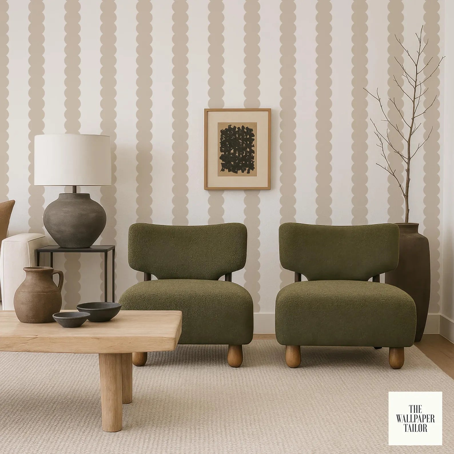 a modern living room with a wooden coffee table, two green armchairs, a lamp, a vase, and a framed artwork on the wall.
