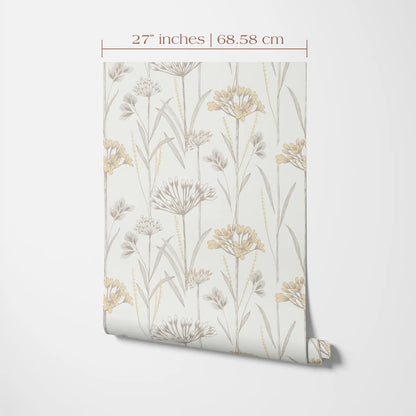 a floral pattern on a piece of paper or fabric, with a ruler indicating its size.