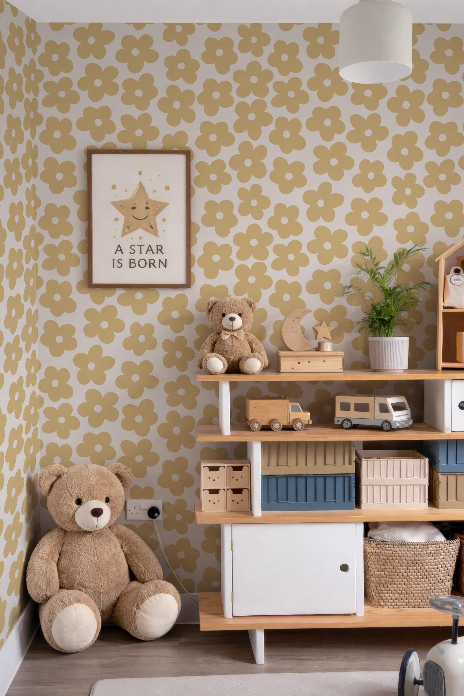 a cozy and charming children's bedroom with a teddy bear, a wooden toy shelf, and a framed wall art.
