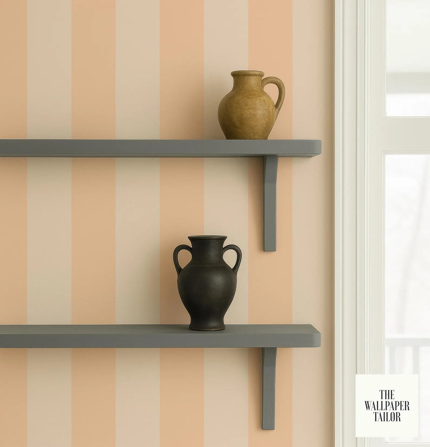 two black vases placed on gray shelves against a striped wall.