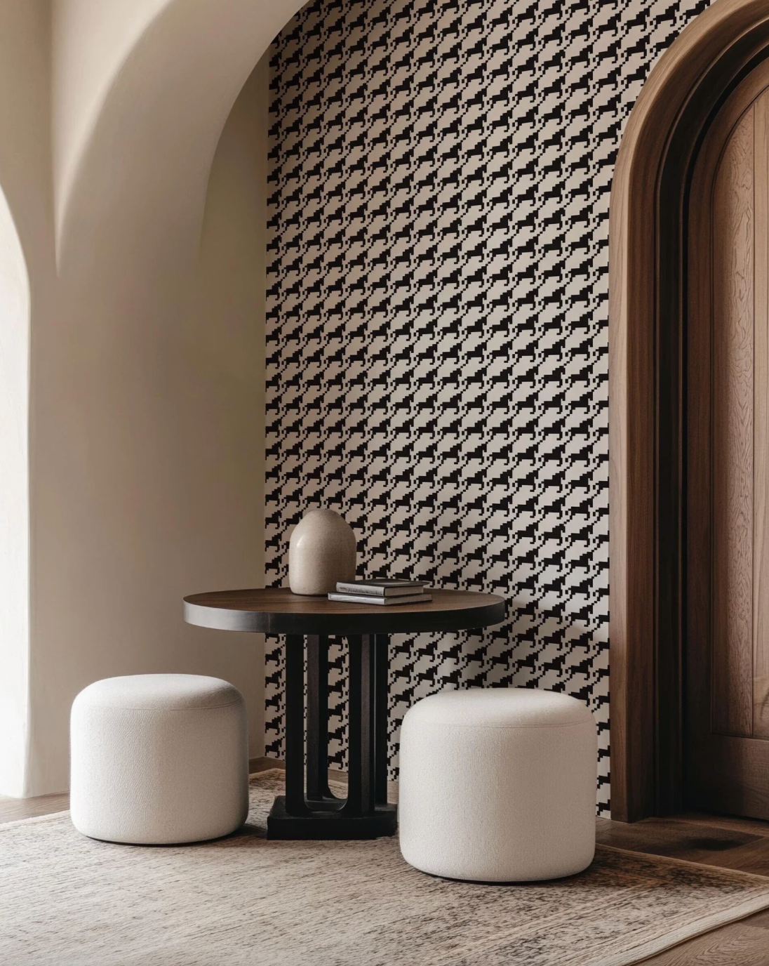 a table and two stools in a room