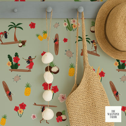 a wallpapered wall with a variety of tropical and beach-themed illustrations, including palm trees, surfboards, flowers, and people enjoying the beach.