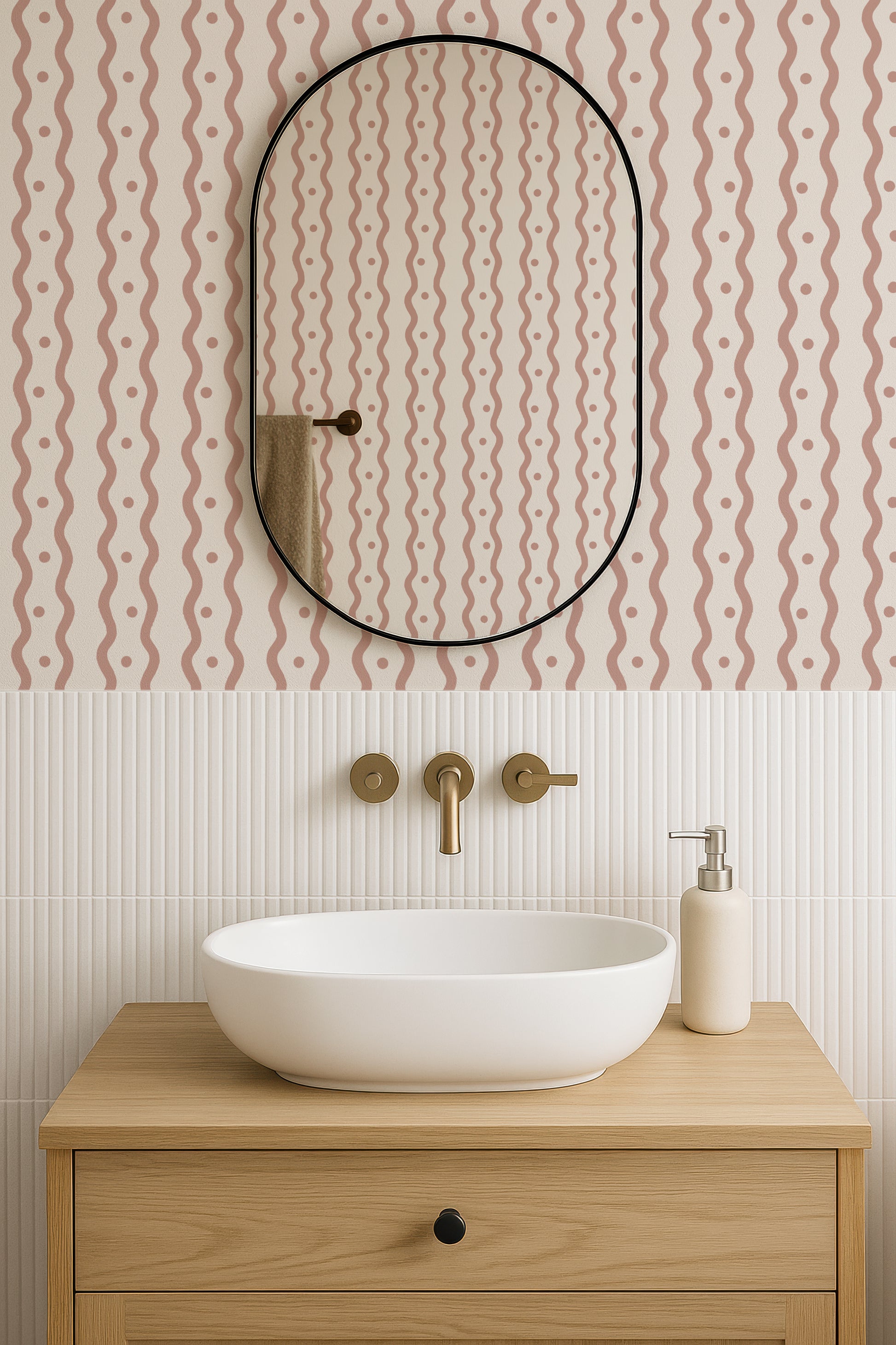 a bathroom with a white oval-shaped sink, a wooden vanity, and a mirror above it. The walls have a pink and white patterned wallpaper, and the overall design has a modern and minimalist aesthetic.
