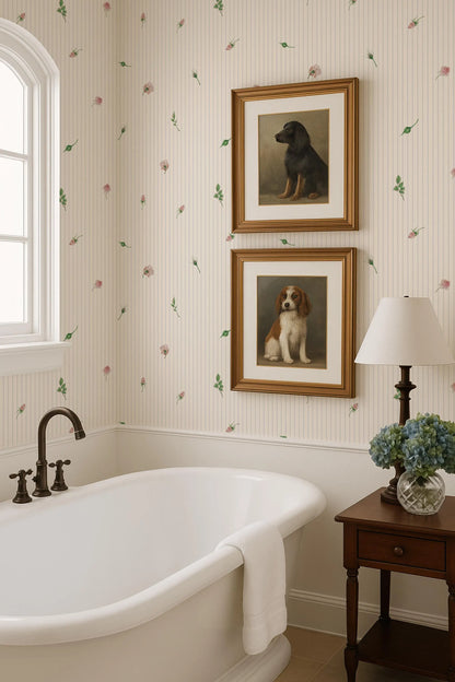 a bathroom with a clawfoot bathtub, framed pictures of dogs, and a lamp on a side table.