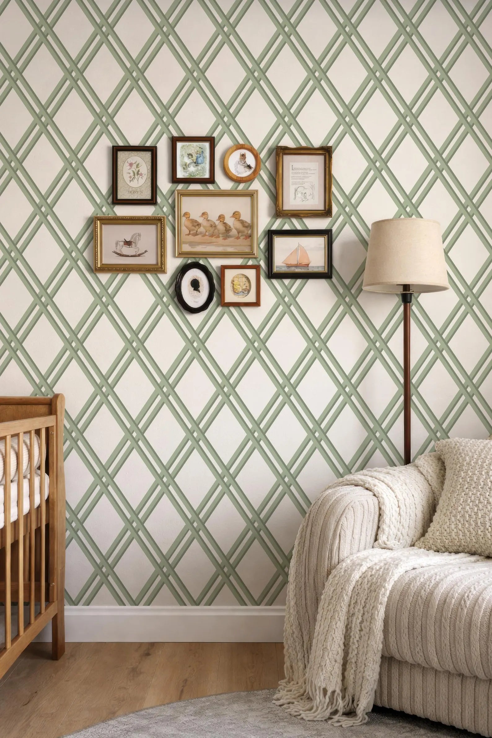 a cozy living room with a white sofa, a wooden rocking chair, and a lamp. The walls are adorned with a diamond pattern wallpaper, and there is a collection of framed pictures and artwork displayed on the wall.