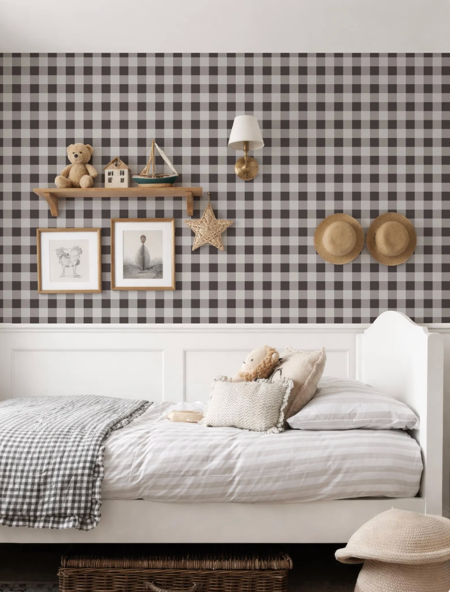 a cozy bedroom with a white bed, a checkered wallpaper, and various decorative elements such as a shelf with a teddy bear, a small boat, and two hats.