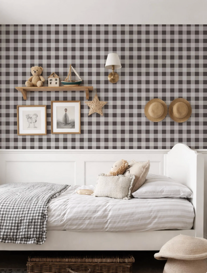 a cozy bedroom with a white bed, a checkered wallpaper, and various decorative elements such as a shelf with a teddy bear, a small boat, and two hats.