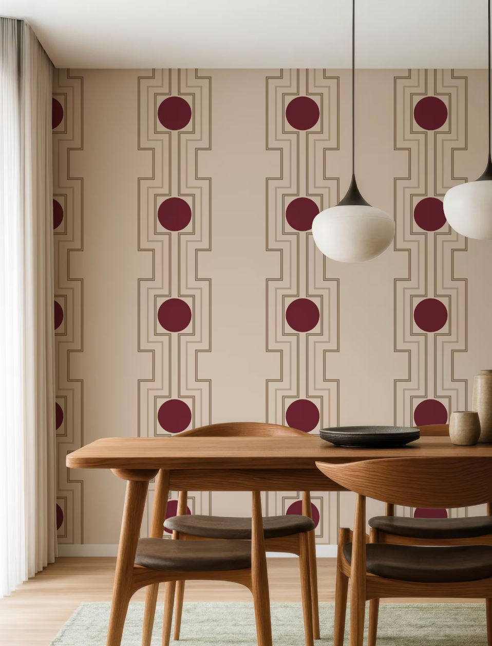 a modern dining room with a wooden table and chairs, a patterned wallpaper, and two pendant lights hanging above the table.