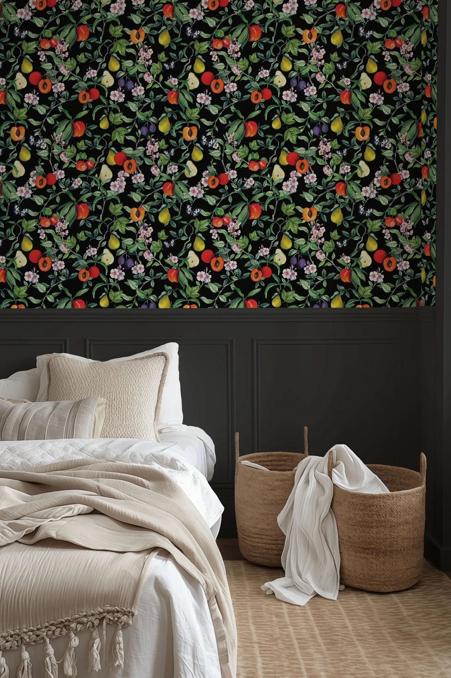 a bedroom with a bed, a basket, and a wallpapered wall featuring a floral pattern.