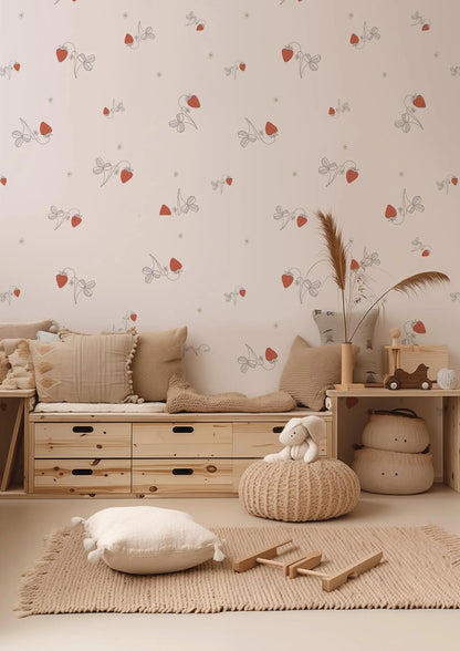 a cozy and inviting nursery or child's room, featuring a wooden bench, a plush chair, and a plush ottoman. The walls are adorned with a pattern of red and white flowers, and the room is decorated with various toys and accents, creating a warm and welcoming atmosphere.