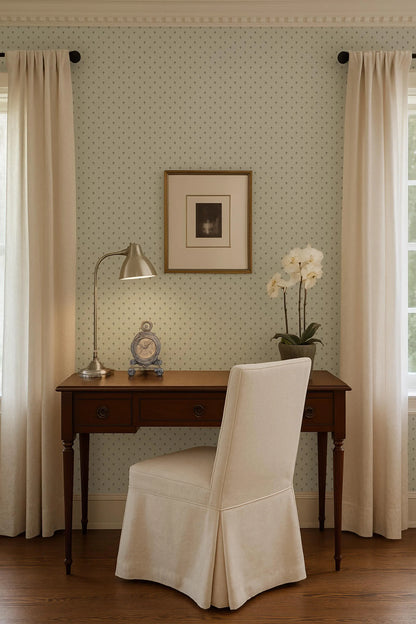 a cozy workspace with a wooden desk, a white chair, a lamp, a clock, and a framed picture on the wall.