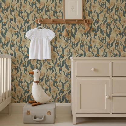 a nursery room with a white dress hanging on a wooden hanger, a stuffed duck sitting on a suitcase, and a wooden shelf with a picture frame above it. The room has a floral wallpaper and a white dresser.