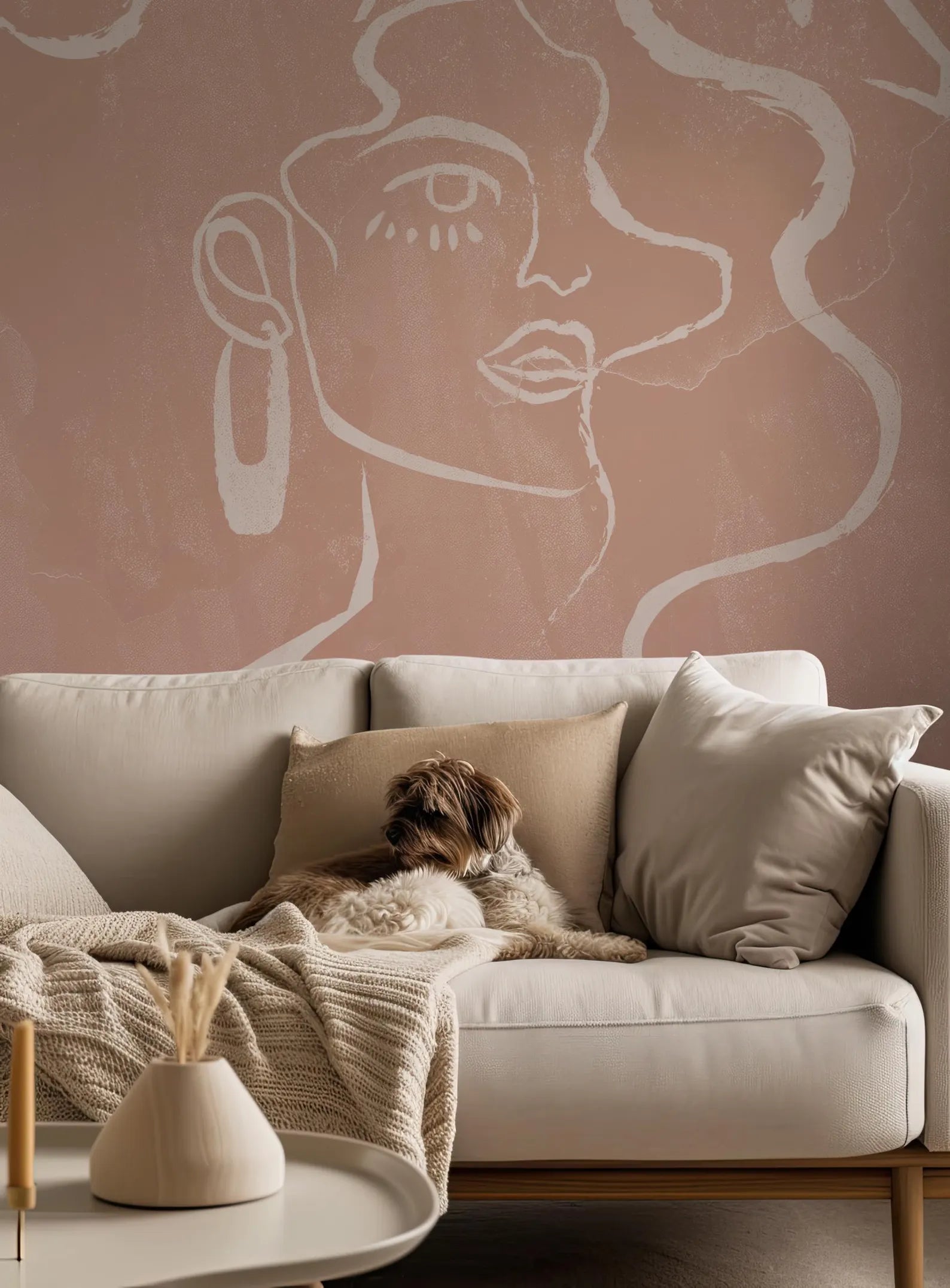 a cozy living room scene with a dog resting on a couch, a coffee table in the foreground, and a large abstract mural on the wall behind the couch.