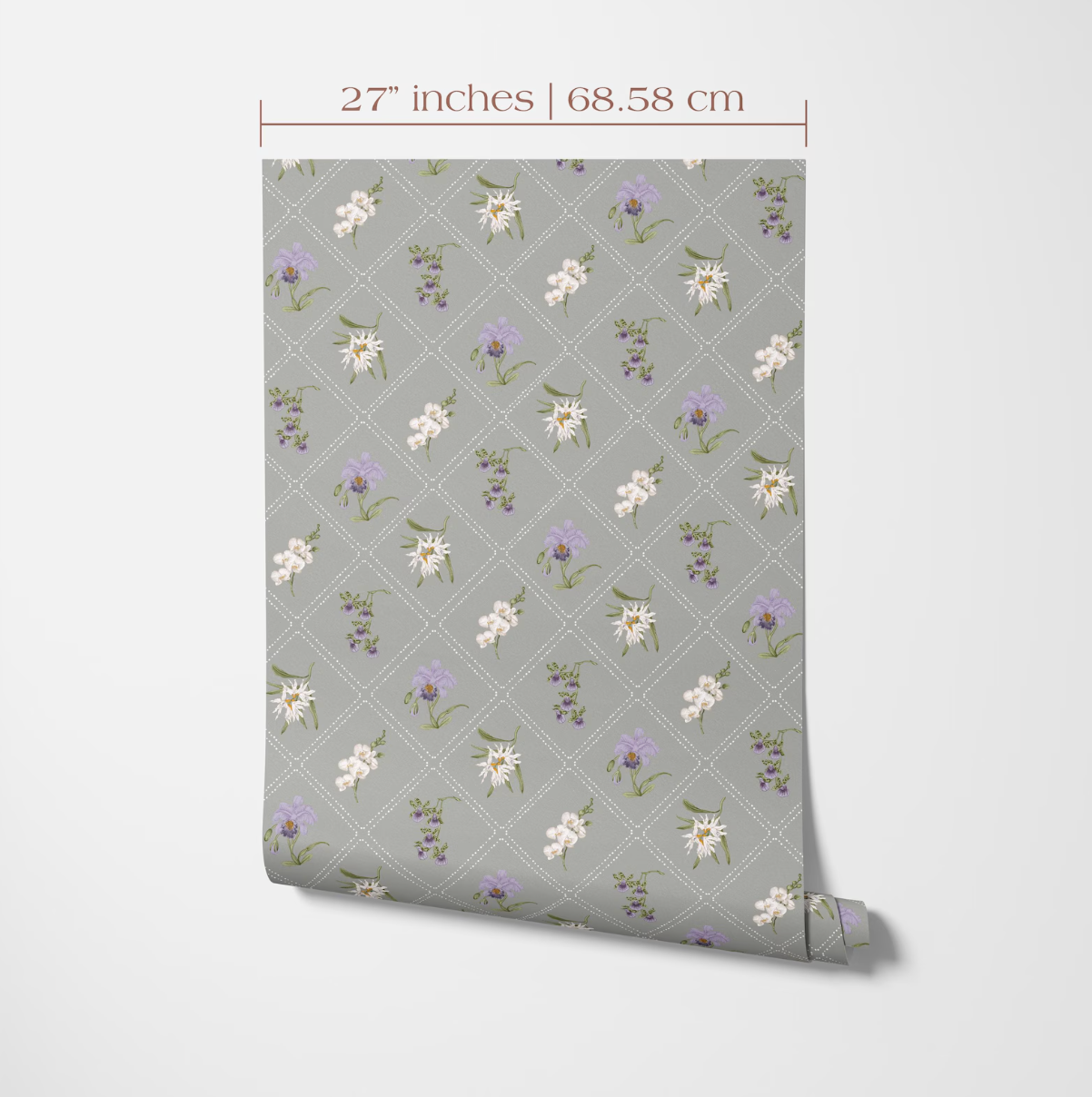 a gray wall with a repeating pattern of white and purple flowers and leaves. The pattern is displayed on a roll of wallpaper or paper, which is being measured for size.