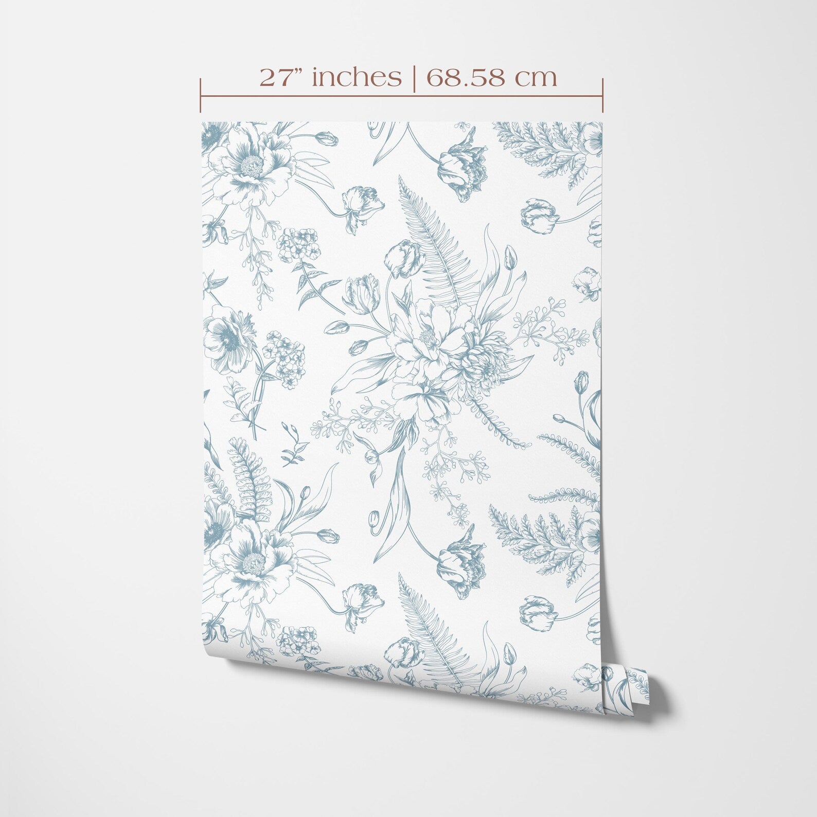 a repeating floral pattern with various flowers and leaves, including roses, ferns, and other botanical elements, all rendered in a light blue color. The pattern is displayed on a white background, and the image is described in terms of its size and dimensions, with the text "27 inches | 68.58 cm" indicating the length and width of the image.