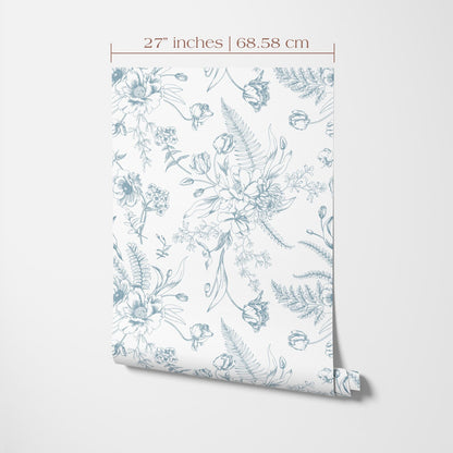 a repeating floral pattern with various flowers and leaves, including roses, ferns, and other botanical elements, all rendered in a light blue color. The pattern is displayed on a white background, and the image is described in terms of its size and dimensions, with the text "27 inches | 68.58 cm" indicating the length and width of the image.