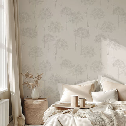 a bed with a white comforter and pillows