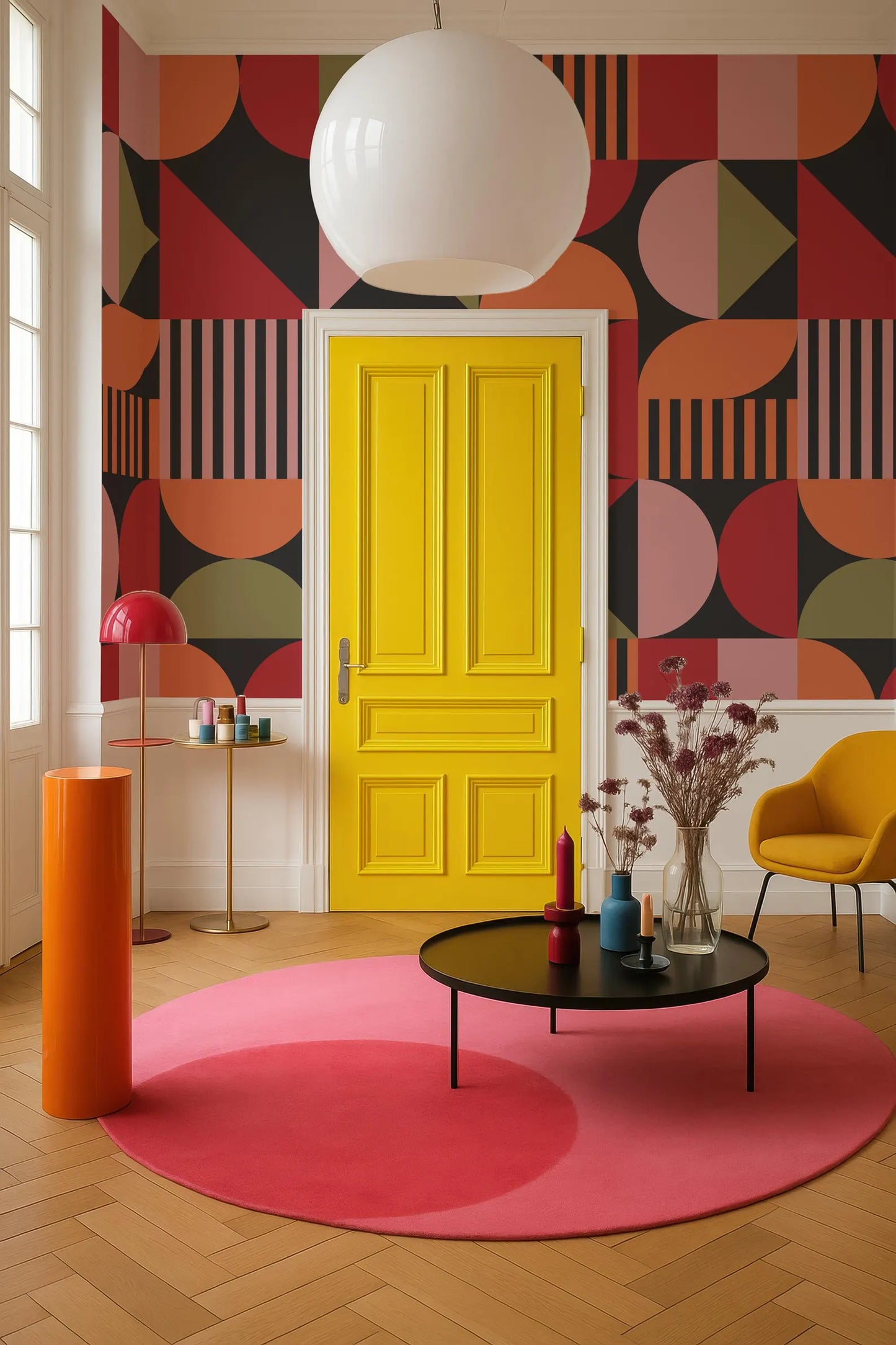 a vibrant and eclectic living room with a bold yellow door, a pink circular rug, and a black coffee table with various decorative items.