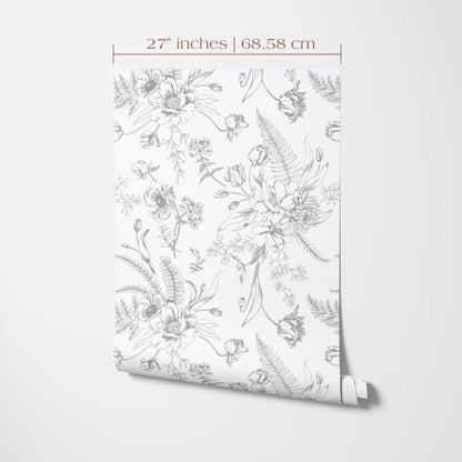 a repeating floral pattern with various flowers and leaves, including roses, ferns, and other botanical elements, all rendered in a black and white style.
