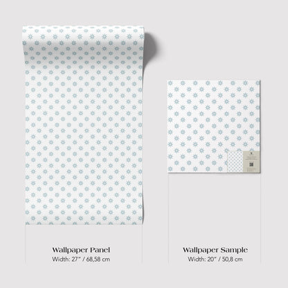 two different sizes of wallpaper panels with a repeating pattern of small white stars on a light blue background.