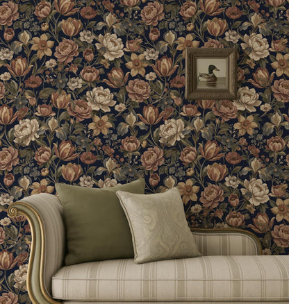 a cozy living room setting with a floral wallpaper pattern in shades of blue and brown. A framed picture of a duck is hanging on the wall above a beige sofa with two throw pillows.